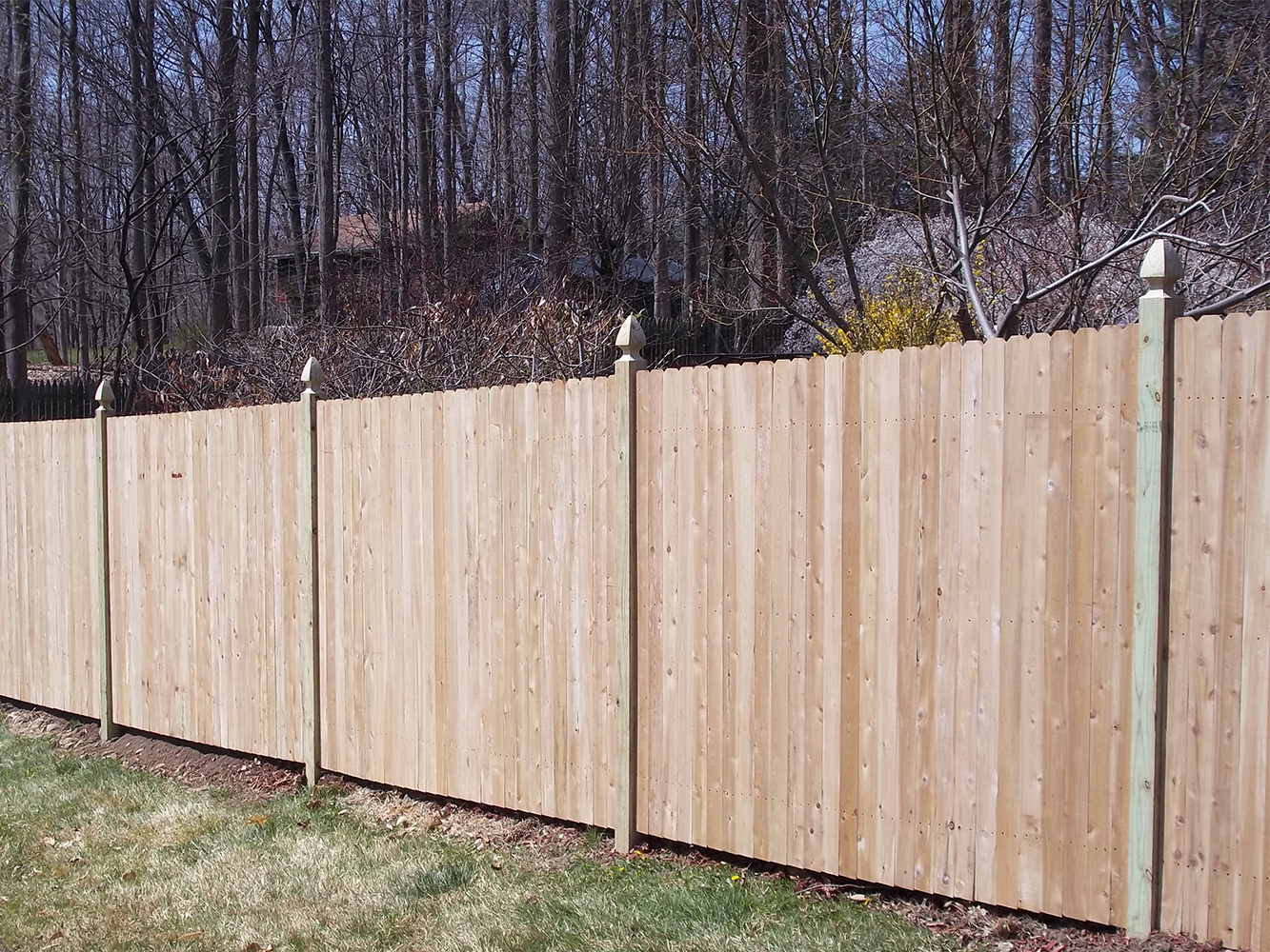 Photo of a wood fence from a fencing contractor in New York