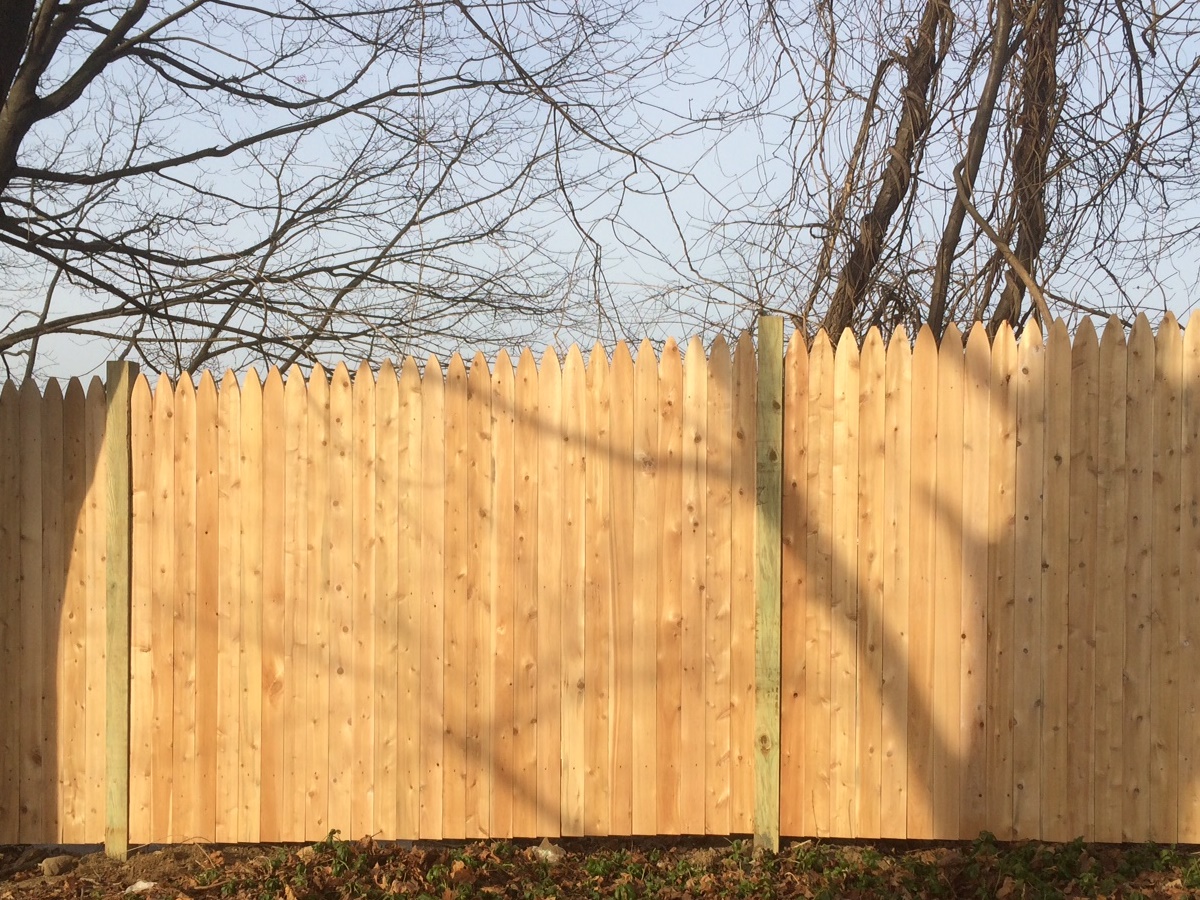 wood fence - Stockade style