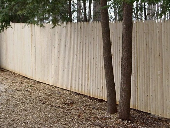 wood fence - Stockade style